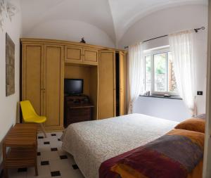 Postel nebo postele na pokoji v ubytování La casa di Armando