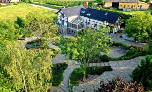 an aerial view of a house with a garden at Estancja Mezowo in Mezowo