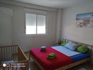 Postel nebo postele na pokoji v ubytování Apartment Verge de Montserrat