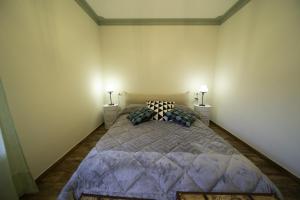 Postel nebo postele na pokoji v ubytování APPARTAMENTO DA DAVID