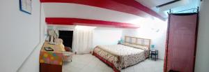 A bed or beds in a room at mansarda pieno centro