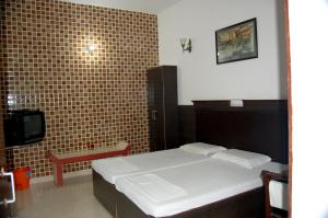 Ένα ή περισσότερα κρεβάτια σε δωμάτιο στο Hotel Sidhartha Walking Distance From TajMahal