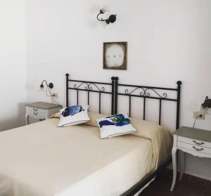 Postel nebo postele na pokoji v ubytování Hotel Rodà