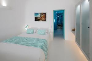 Ένα ή περισσότερα κρεβάτια σε δωμάτιο στο Dreams Luxury Suites  +123 φωτογραφίες
