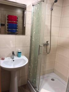 Апартаменты SunRiseにあるバスルーム +22枚の写真