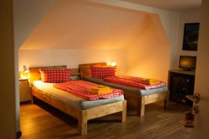 Un pat sau paturi într-o cameră la Vila Belaggio