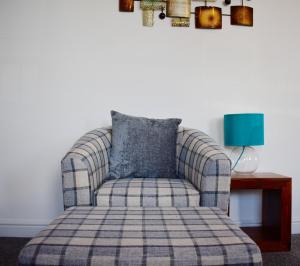 A bed or beds in a room at Apartments @52 