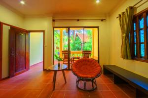 Posezení v ubytování Le Jardin d'Angkor Hotel & Resort