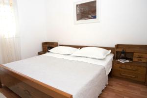 Posteľ alebo postele v izbe v ubytovaní Apartments Drago Kovačić