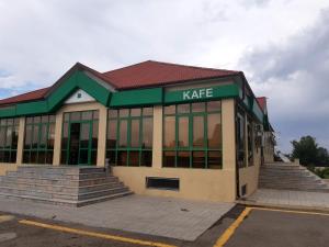 a building with a kate sign on it at AZPETROL HOTEL GAZAX in Qazax