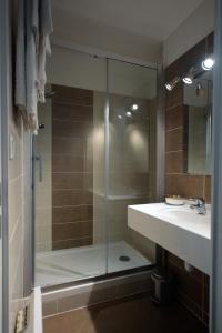 Bathroom sa Hotel Albizzia