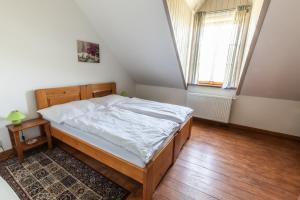 Postel nebo postele na pokoji v ubytování Penzion Dvůr Krasíkov