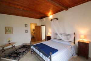 Ένα ή περισσότερα κρεβάτια σε δωμάτιο στο Podere I Gigli +35 φωτογραφίες