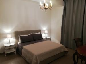 Postel nebo postele na pokoji v ubytování DreaMilan B&B