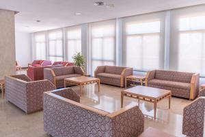 Posezení v ubytování Hotel Club Cala Romani