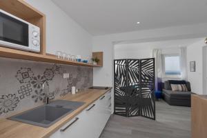 Kuchyň nebo kuchyňský kout v ubytování Apartments Strada Tučepi