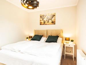 Posteľ alebo postele v izbe v ubytovaní VacationClub – Rezydencja Park Orła Apartament 12
