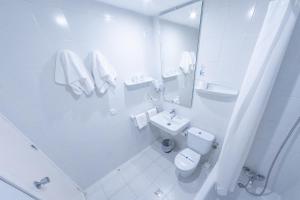 Koupelna v ubytování Hotel Club Cala Romani