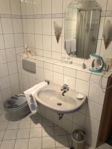 Koupelna v ubytování Landhaus Wilhelmshöhe