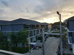 arial view of a building with a street in front at Townhouse 5 mins from Central Airport plaza changmai in Chiang Mai