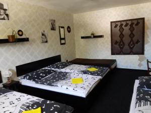 Posteľ alebo postele v izbe v ubytovaní Penzion Union Harrachov