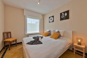 Postel nebo postele na pokoji v ubytování Vlaeberg Cottage
