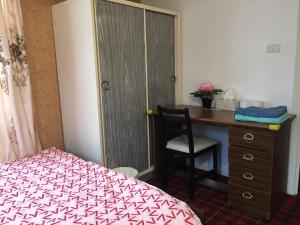 Postel nebo postele na pokoji v ubytování ADA Homestay