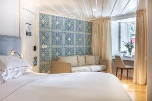 Postel nebo postele na pokoji v ubytování Santiago de Alfama - Boutique Hotel