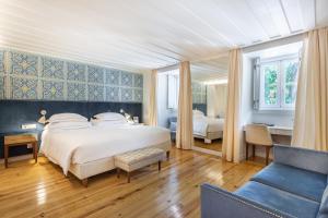 Postel nebo postele na pokoji v ubytování Santiago de Alfama - Boutique Hotel