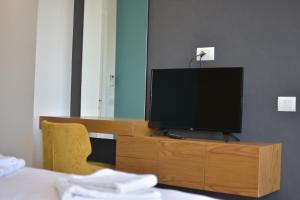 Airen Hotel Velipoje TV 또는 엔터테인먼트 센터
