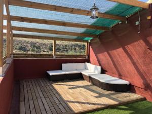 Balkon lub taras w obiekcie El Cortijillo