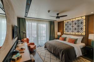 Ένα ή περισσότερα κρεβάτια σε δωμάτιο στο Boutique Hotel & Spa Casa del Mare - Mediterraneo