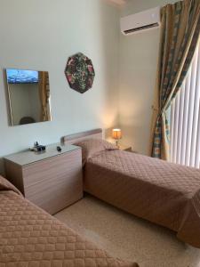 Postel nebo postele na pokoji v ubytování Cloud 9 Residence