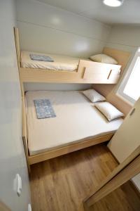 Postel nebo postele na pokoji v ubytování Mobile home CVITA