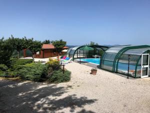 The swimming pool at or close to Baita Rosa