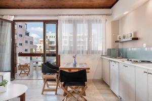 Kuchyň nebo kuchyňský kout v ubytování Magia Apartments