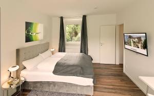 Katil atau katil-katil dalam bilik di Eco Smart Apartments Nürnberg Süd