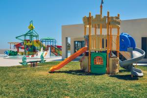 a playground with a slide and a slidesktop at Iberostar Selection Kuriat Palace in Monastir