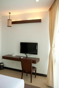 TV a/nebo společenská místnost v ubytování D'Hotel & Suites + 16 fotografií