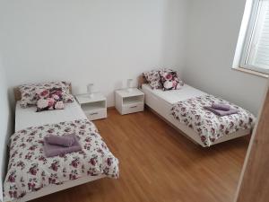 Postel nebo postele na pokoji v ubytování Holiday home Kastela Village + 37 fotografií