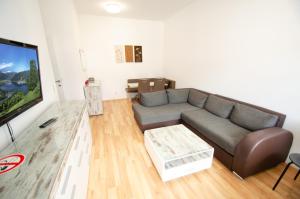 Telewizja i/lub zestaw kina domowego w obiekcie Apartment CityXpress TOP 7