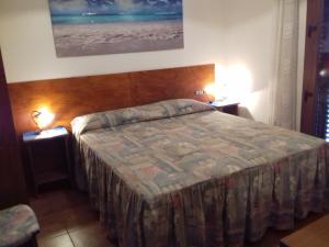 A bed or beds in a room at Canne Al Vento