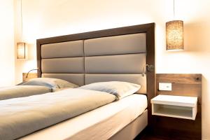 Postel nebo postele na pokoji v ubytování Hotel Rubus