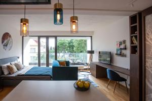 Posteľ alebo postele v izbe v ubytovaní Cosy Design Apartment IV