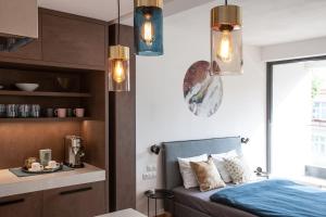 Posteľ alebo postele v izbe v ubytovaní Cosy Design Apartment IV