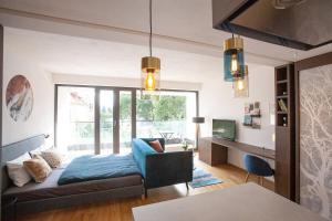 Posteľ alebo postele v izbe v ubytovaní Cosy Design Apartment IV