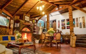 Posezení v ubytování La Colina Hotel Cottage