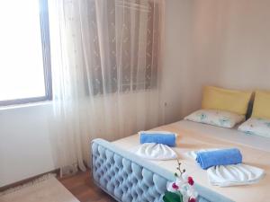 Voodi või voodid majutusasutuse Guesthouse DONA toas