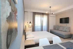 A bed or beds in a room at Agreste Luxury Apartments