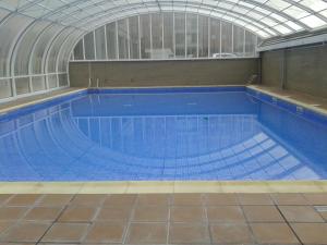 Bazén v ubytování TORRE de la FUENTE AprtoVistas Piscina Parking nebo v jeho okolí